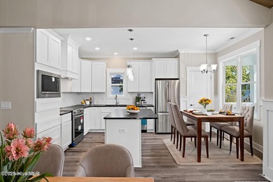 Experience the perfect blend of modern luxury and coastal charm on Brick Landing Plantation Yacht and Golf Club in North Carolina - for sale on GolfHomes.com, golf home, golf lot