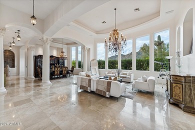 If you're seeking a home where stunning mountain views greet you on Troon Country Club in Arizona - for sale on GolfHomes.com, golf home, golf lot