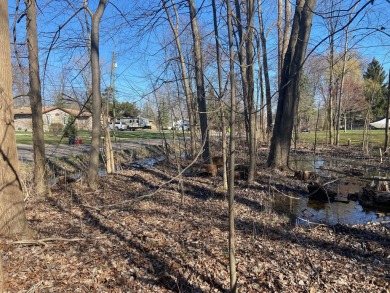 Rare find! Welcome to one of the last vacant lots in Harrison on Gowanie Golf Club in Michigan - for sale on GolfHomes.com, golf home, golf lot