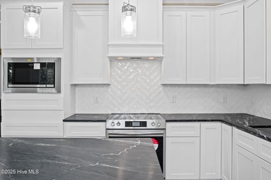 Experience the perfect blend of modern luxury and coastal charm on Brick Landing Plantation Yacht and Golf Club in North Carolina - for sale on GolfHomes.com, golf home, golf lot