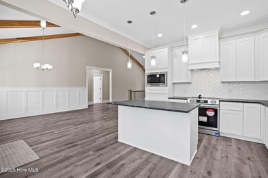 Experience the perfect blend of modern luxury and coastal charm on Brick Landing Plantation Yacht and Golf Club in North Carolina - for sale on GolfHomes.com, golf home, golf lot