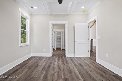 Experience the perfect blend of modern luxury and coastal charm on Brick Landing Plantation Yacht and Golf Club in North Carolina - for sale on GolfHomes.com, golf home, golf lot