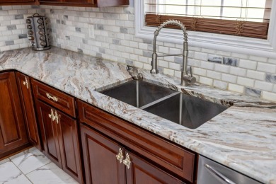 This stunning custom-built home was designed with a large family on Lakeview Golf Course in Virginia - for sale on GolfHomes.com, golf home, golf lot