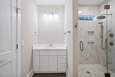 Experience the perfect blend of modern luxury and coastal charm on Brick Landing Plantation Yacht and Golf Club in North Carolina - for sale on GolfHomes.com, golf home, golf lot