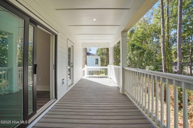 Experience the perfect blend of modern luxury and coastal charm on Brick Landing Plantation Yacht and Golf Club in North Carolina - for sale on GolfHomes.com, golf home, golf lot