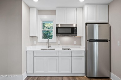 Experience the perfect blend of modern luxury and coastal charm on Brick Landing Plantation Yacht and Golf Club in North Carolina - for sale on GolfHomes.com, golf home, golf lot