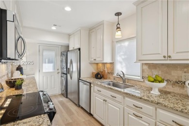 Sought-after and rarely available, this newly renovated end-unit on Dolphin Head Golf Club in South Carolina - for sale on GolfHomes.com, golf home, golf lot