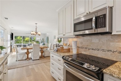 Sought-after and rarely available, this newly renovated end-unit on Dolphin Head Golf Club in South Carolina - for sale on GolfHomes.com, golf home, golf lot