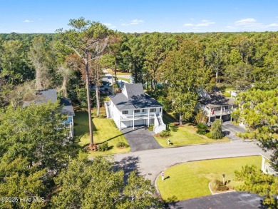 Experience the perfect blend of modern luxury and coastal charm on Brick Landing Plantation Yacht and Golf Club in North Carolina - for sale on GolfHomes.com, golf home, golf lot