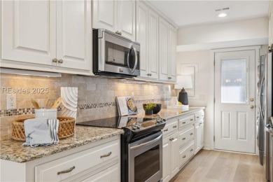 Sought-after and rarely available, this newly renovated end-unit on Dolphin Head Golf Club in South Carolina - for sale on GolfHomes.com, golf home, golf lot