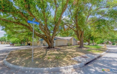 Beautifully updated home on a spacious corner lot, conveniently on Sammons Golf Links in Texas - for sale on GolfHomes.com, golf home, golf lot