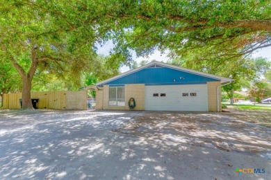 Beautifully updated home on a spacious corner lot, conveniently on Sammons Golf Links in Texas - for sale on GolfHomes.com, golf home, golf lot