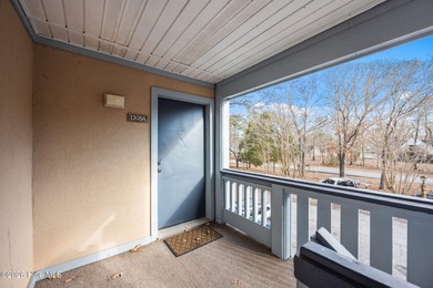 Fully furnished and thoughtfully updated, this two-level condo on Harbour Point Golf Club in North Carolina - for sale on GolfHomes.com, golf home, golf lot