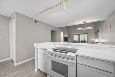 Fully furnished and thoughtfully updated, this two-level condo on Harbour Point Golf Club in North Carolina - for sale on GolfHomes.com, golf home, golf lot