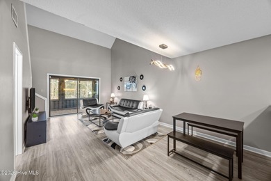 Fully furnished and thoughtfully updated, this two-level condo on Harbour Point Golf Club in North Carolina - for sale on GolfHomes.com, golf home, golf lot