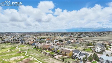 Captivating, custom 5BR, 4BA, stucco/stone home on Antler Creek on Antler Creek Golf Course in Colorado - for sale on GolfHomes.com, golf home, golf lot