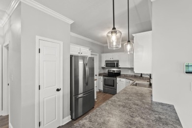 Located on the 16th fairway of the Peninsula Golf Resort, this on Peninsula Golf Resort in Kentucky - for sale on GolfHomes.com, golf home, golf lot