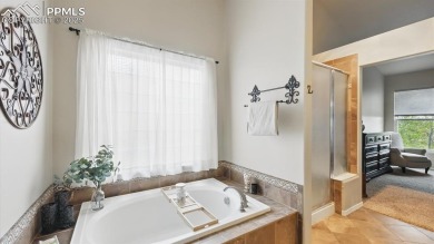 Captivating, custom 5BR, 4BA, stucco/stone home on Antler Creek on Antler Creek Golf Course in Colorado - for sale on GolfHomes.com, golf home, golf lot