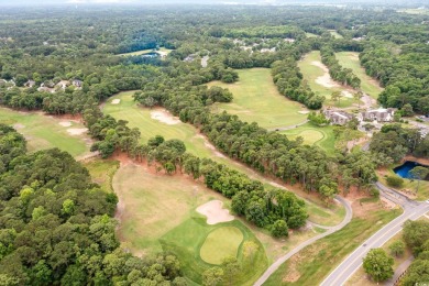 Welcome to your coastal oasis in the serene community of Pawleys on The Tradition Golf Club in South Carolina - for sale on GolfHomes.com, golf home, golf lot