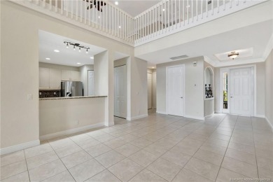 Enjoy serene waterfront views and beautiful sunsets from this on Palm Cove Golf and Yacht Club in Florida - for sale on GolfHomes.com, golf home, golf lot