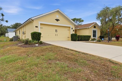Discover the essence of Florida living in this beautifully on Twisted Oaks Golf Club in Florida - for sale on GolfHomes.com, golf home, golf lot