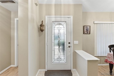 Discover the essence of Florida living in this beautifully on Twisted Oaks Golf Club in Florida - for sale on GolfHomes.com, golf home, golf lot