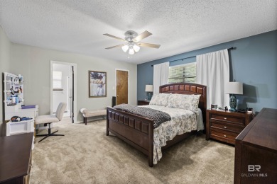 Welcome to this inviting 3-bedroom, 2.5-bath home on the golf on Lake Forest Yacht and Country Club in Alabama - for sale on GolfHomes.com, golf home, golf lot