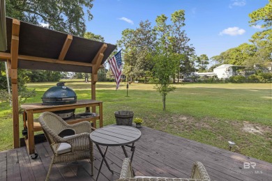 Welcome to this inviting 3-bedroom, 2.5-bath home on the golf on Lake Forest Yacht and Country Club in Alabama - for sale on GolfHomes.com, golf home, golf lot