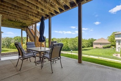 This is a stunning reverse 1.5-story home with picturesque views on Fred Arbanas Golf Course At Longview Lakes - Longview Lake in Missouri - for sale on GolfHomes.com, golf home, golf lot