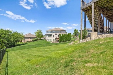 This is a stunning reverse 1.5-story home with picturesque views on Fred Arbanas Golf Course At Longview Lakes - Longview Lake in Missouri - for sale on GolfHomes.com, golf home, golf lot