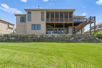 This is a stunning reverse 1.5-story home with picturesque views on Fred Arbanas Golf Course At Longview Lakes - Longview Lake in Missouri - for sale on GolfHomes.com, golf home, golf lot