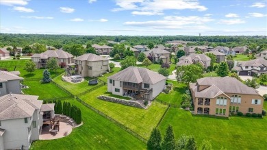 This is a stunning reverse 1.5-story home with picturesque views on Fred Arbanas Golf Course At Longview Lakes - Longview Lake in Missouri - for sale on GolfHomes.com, golf home, golf lot