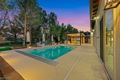 Welcome to this breathtaking semi-custom Christopher Home on Southern Highlands Golf Club in Nevada - for sale on GolfHomes.com, golf home, golf lot