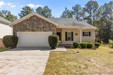 Welcome to this wonderful home in the highly sought-after on Woodlake Country Club in North Carolina - for sale on GolfHomes.com, golf home, golf lot