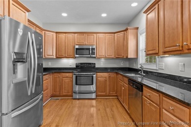 Welcome to this wonderful home in the highly sought-after on Woodlake Country Club in North Carolina - for sale on GolfHomes.com, golf home, golf lot
