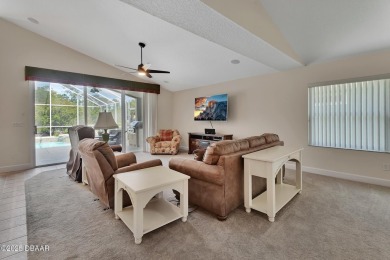 Discover this impeccably maintained pool home located on the on Plantation Bay Golf and Country Club in Florida - for sale on GolfHomes.com, golf home, golf lot
