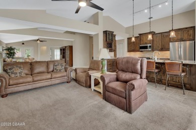 Discover this impeccably maintained pool home located on the on Plantation Bay Golf and Country Club in Florida - for sale on GolfHomes.com, golf home, golf lot