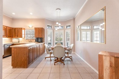This clean, single-story brick home sits on a large lot and on De Cordova Bend Country Club in Texas - for sale on GolfHomes.com, golf home, golf lot