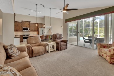 Discover this impeccably maintained pool home located on the on Plantation Bay Golf and Country Club in Florida - for sale on GolfHomes.com, golf home, golf lot