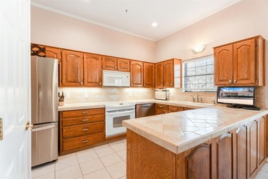 This clean, single-story brick home sits on a large lot and on De Cordova Bend Country Club in Texas - for sale on GolfHomes.com, golf home, golf lot