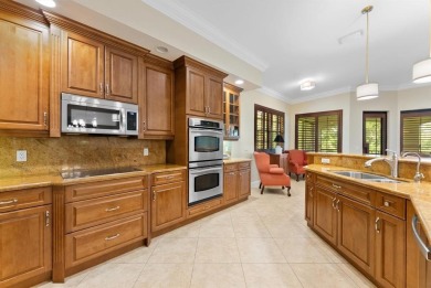 Behind a breathtaking guard-gated entrance, manicured on Parkland Golf Club in Florida - for sale on GolfHomes.com, golf home, golf lot