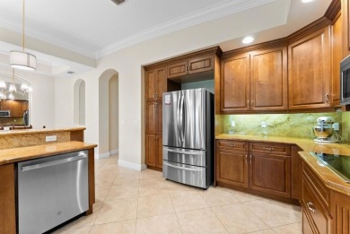 Behind a breathtaking guard-gated entrance, manicured on Parkland Golf Club in Florida - for sale on GolfHomes.com, golf home, golf lot