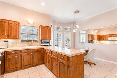 This clean, single-story brick home sits on a large lot and on De Cordova Bend Country Club in Texas - for sale on GolfHomes.com, golf home, golf lot