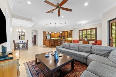 Behind a breathtaking guard-gated entrance, manicured on Parkland Golf Club in Florida - for sale on GolfHomes.com, golf home, golf lot