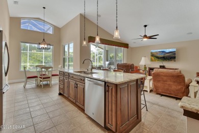 Discover this impeccably maintained pool home located on the on Plantation Bay Golf and Country Club in Florida - for sale on GolfHomes.com, golf home, golf lot