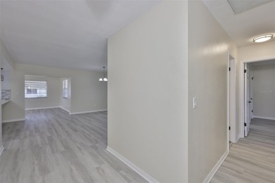 Experience modern comfort and thoughtful upgrades in this on Falcon Watch Golf Club in Florida - for sale on GolfHomes.com, golf home, golf lot