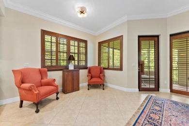 Behind a breathtaking guard-gated entrance, manicured on Parkland Golf Club in Florida - for sale on GolfHomes.com, golf home, golf lot