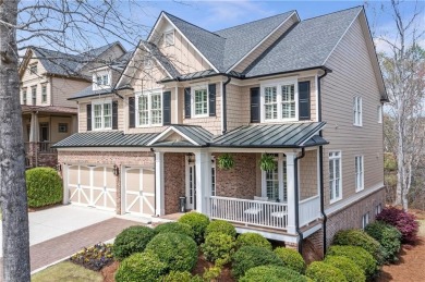 Thoughtfully expanded beyond the builder's original design with on Windermere Golf Club in Georgia - for sale on GolfHomes.com, golf home, golf lot