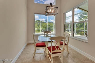 Discover this impeccably maintained pool home located on the on Plantation Bay Golf and Country Club in Florida - for sale on GolfHomes.com, golf home, golf lot