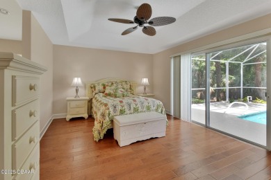 Discover this impeccably maintained pool home located on the on Plantation Bay Golf and Country Club in Florida - for sale on GolfHomes.com, golf home, golf lot